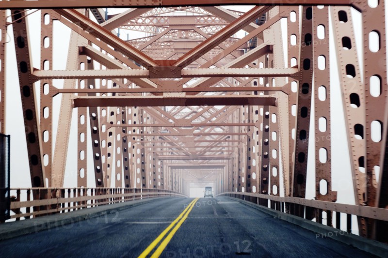 Two-Lane Bridge, Vehicle pulling Horse Trailer in Distance,