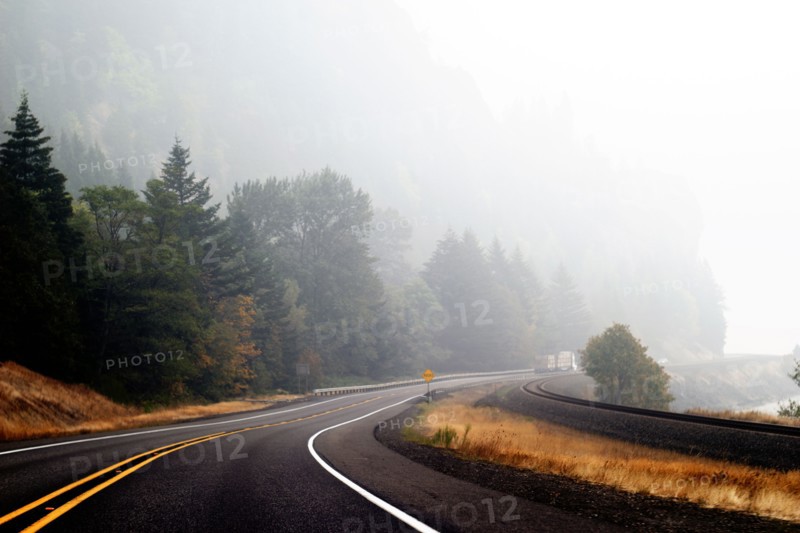 Curving Highway, Wildfire Smoke obstructing View into Distance,
