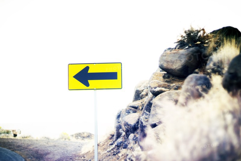 Directional Sign at Edge of Road,,