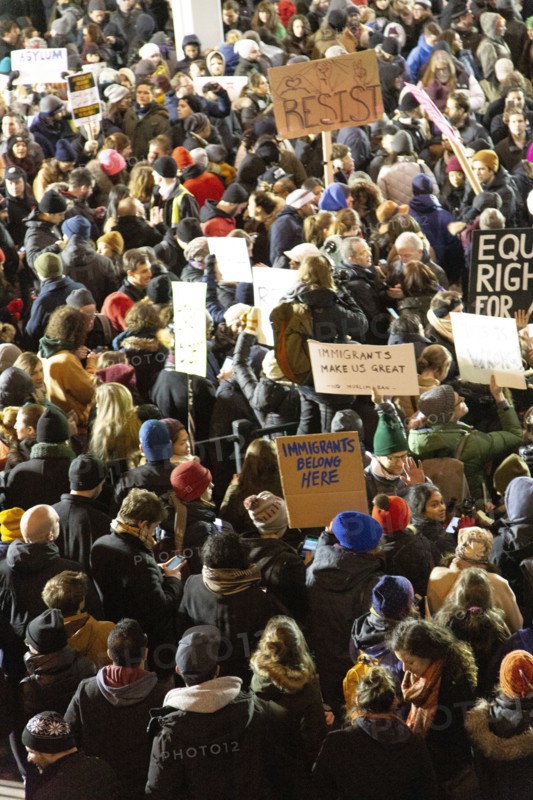High Angle View of Crowd holding Signs at Protest against Muslim Travel Ban, JFK Airport,