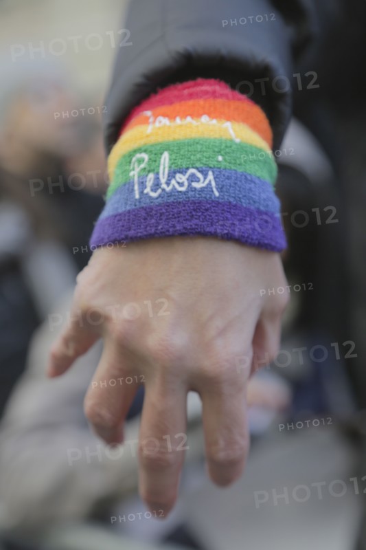 Woman wearing Nancy Pelosi LGBTQ Wristband during LGBTQ Rally, West Village, February 2017