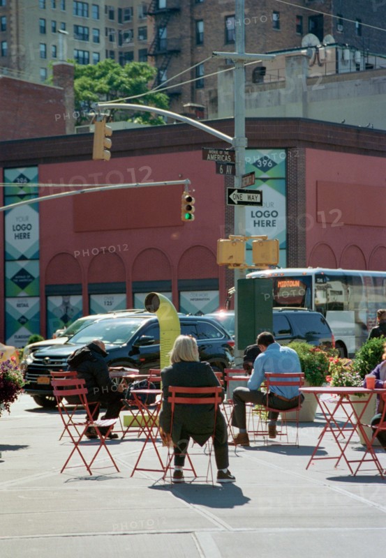 People sitting in Chairs, Street Scene, USA