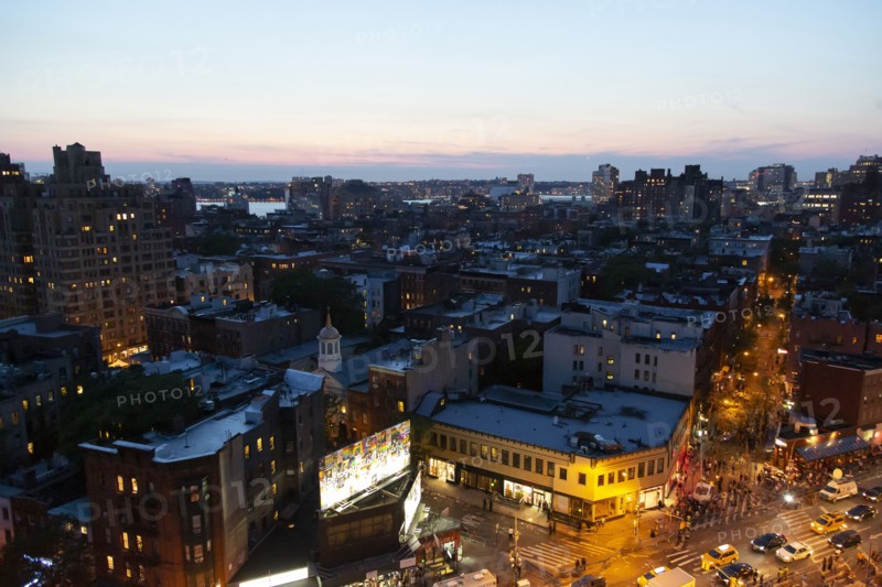 Cityscape at Dusk, Hudson River in Background,