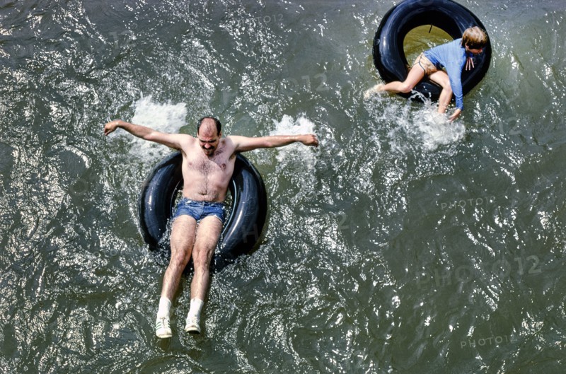 Two People floating in Inner Tube, High Angle View