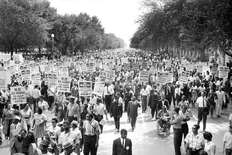 Crowd with Signs at March on Washington for Jobs and Freedom, Washington Monument in Background