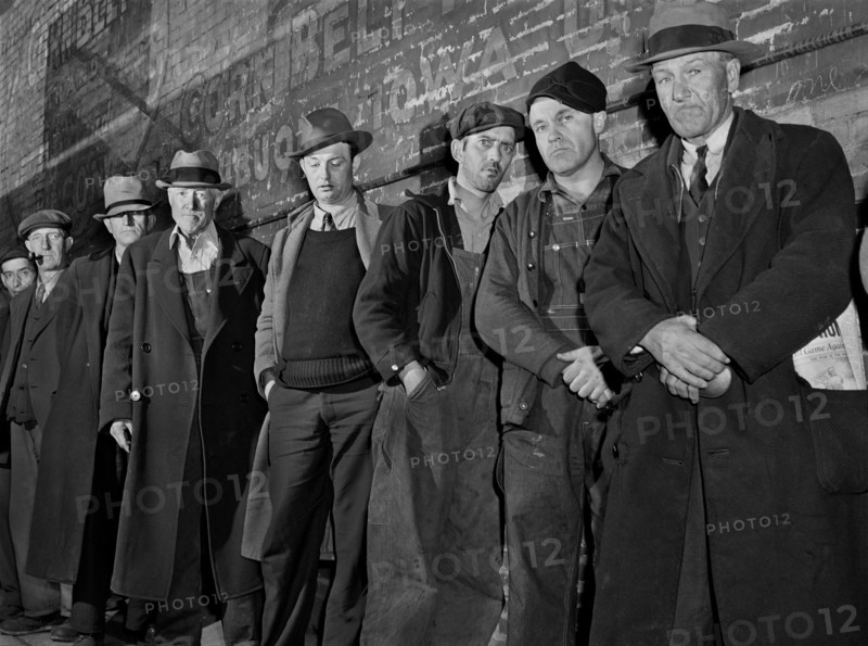 Men waiting in Line outside City Mission, First Twenty-five will be Fed