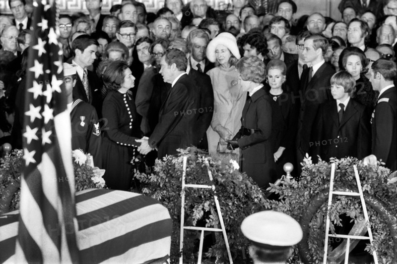 U.S. President speaking with Claudia "Lady Bird" Johnson during former U.S. President Lyndon Johnson's Funeral inside Capitol Building, Washington