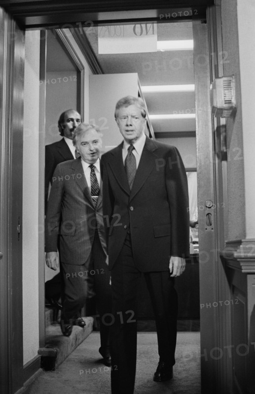 U.S. President Jimmy Carter walks with members of the Three Mile Island Commission, Washington D.C.