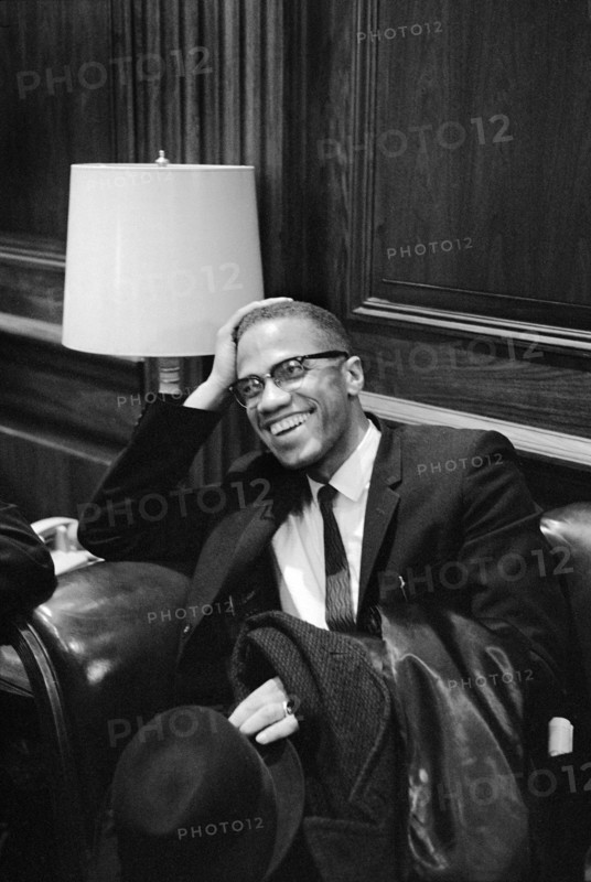 Malcolm X waiting at Martin Luther King Press Conference, Head and Shoulders Portrait