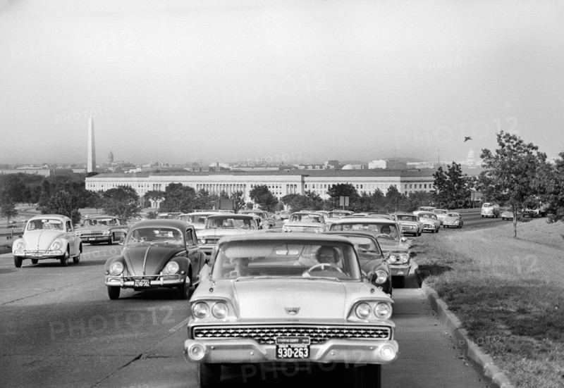 Rush Hour Traffic with Washington Memorial, Pentagon and Capitol Building in Background