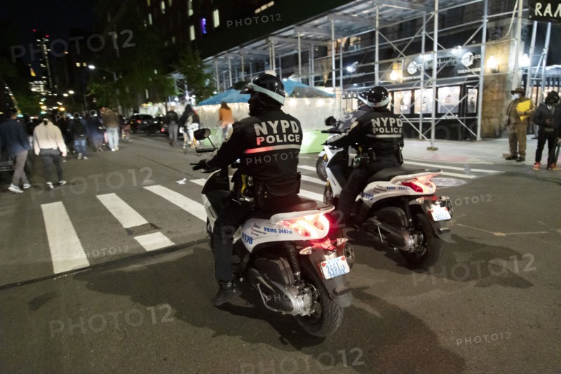 Two NYPD Officers on Motorcycles, Street Scene at Night before Election