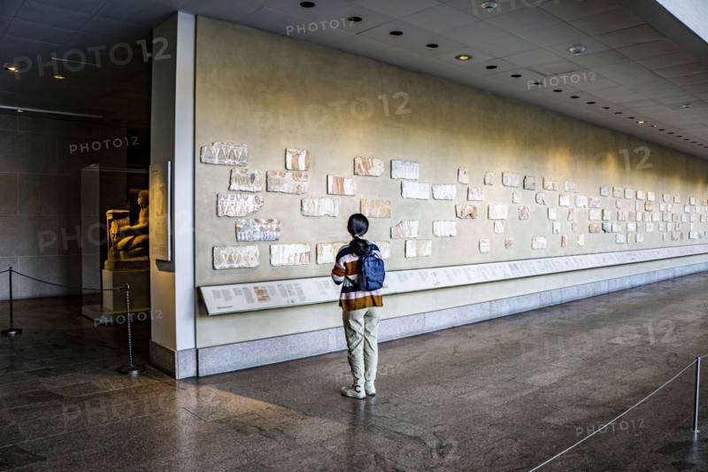 Teen Girl viewing Ancient Egyptian Hieroglyphs, Temple of Dendur