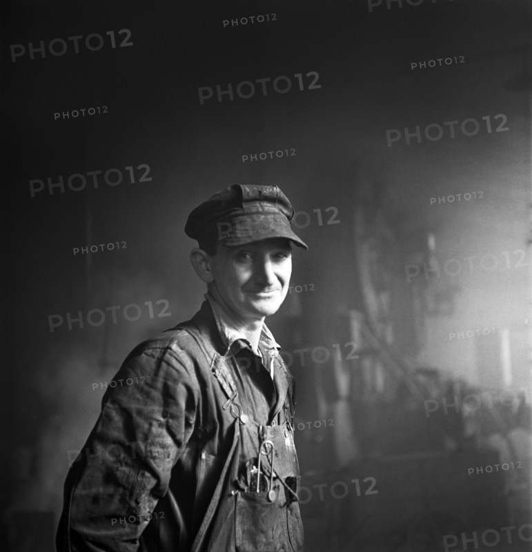 Welder employed in the Roundhouse at a Chicago and Northwestern Railroad Yard