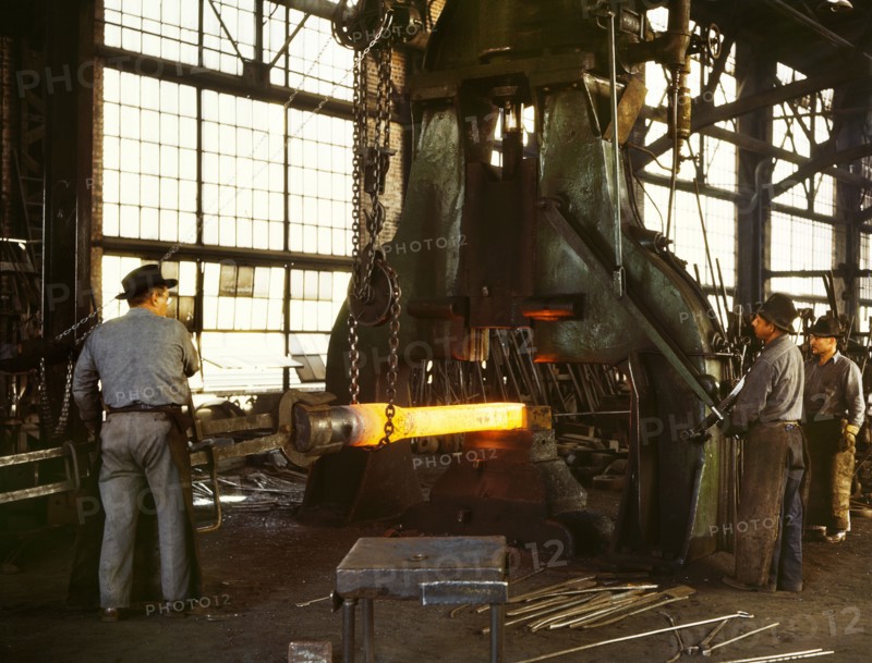 Workers hammering out Draw Bar on Steam Drop Hammer in Blacksmith Shop