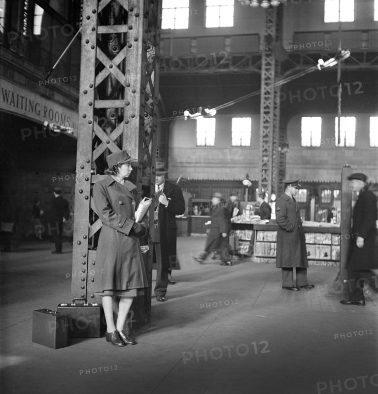 Member of Women's Army Auxiliary Corps waiting for Train