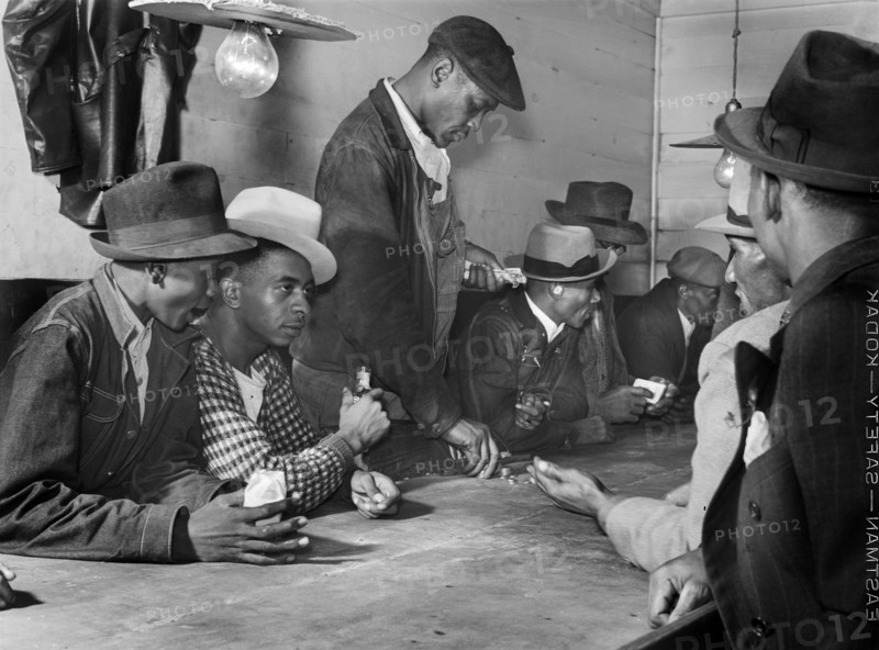 Men spending their money in Gambling and Juke Joint