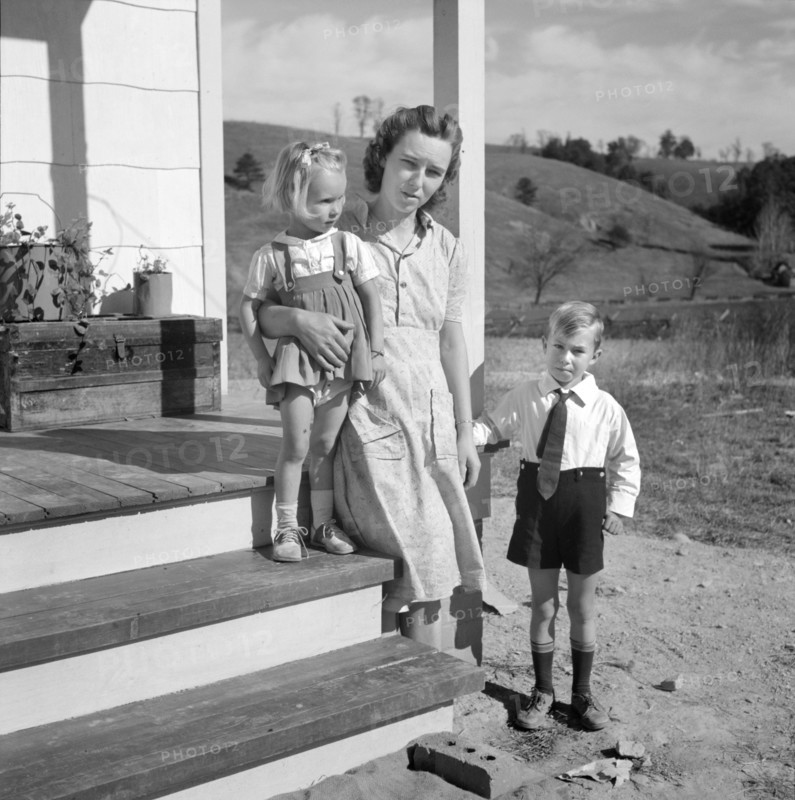 Mr. Howard H. Smith with her children Elsie Marie and Howard Jr.