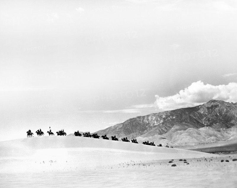Military on Horseback in Desert