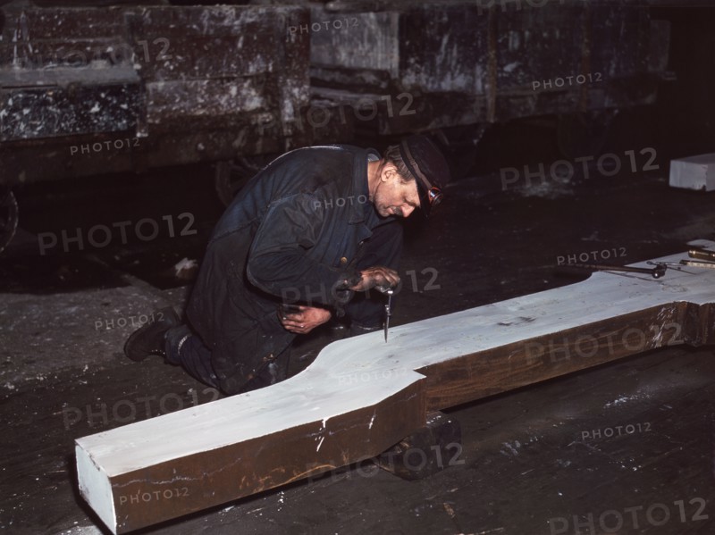 Workman repairing broken Locomotive Frame