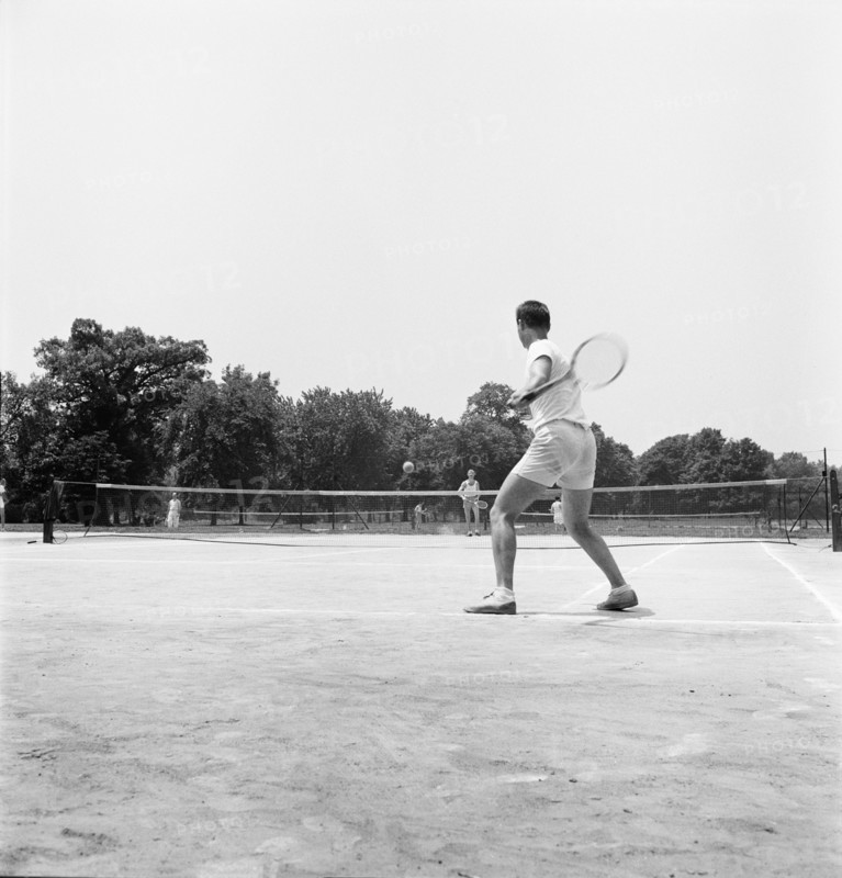 Two Men playing Tennis
