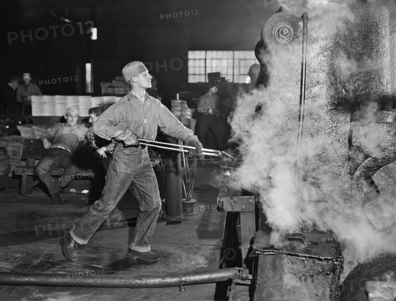 Worker at Rolling Machine