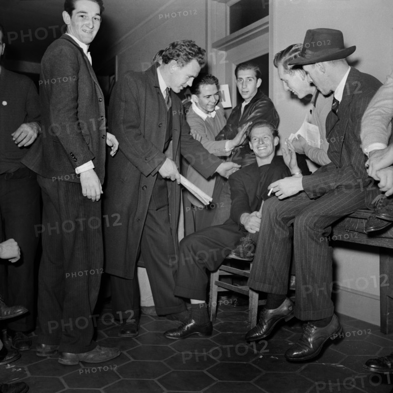 Group of Young Men waiting to Enlist at U.S. Navy Recruitment Headquarters