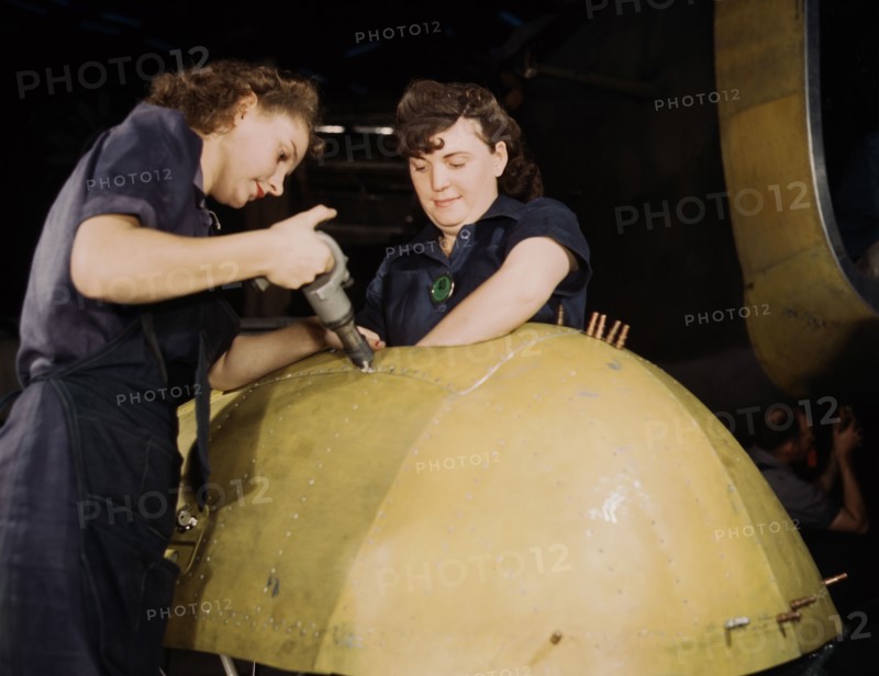 Two Woman working on "Vengeance" dive bomber
