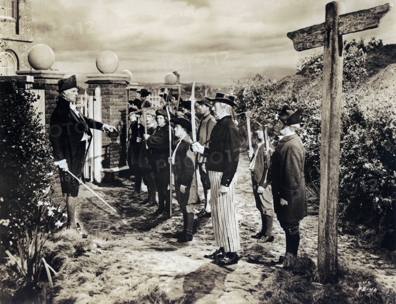 C. Aubrey Smith (far left)
