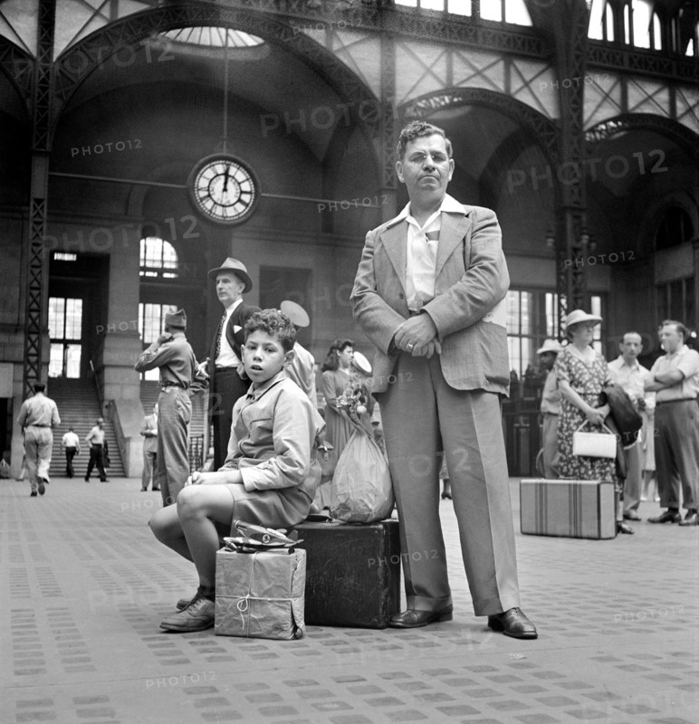 Group of People waiting for Trains