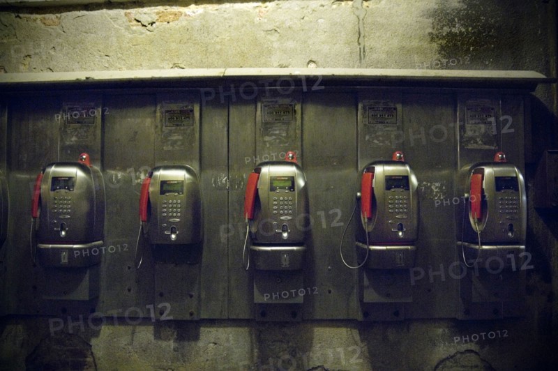 Row of Pay Telephones at Night
