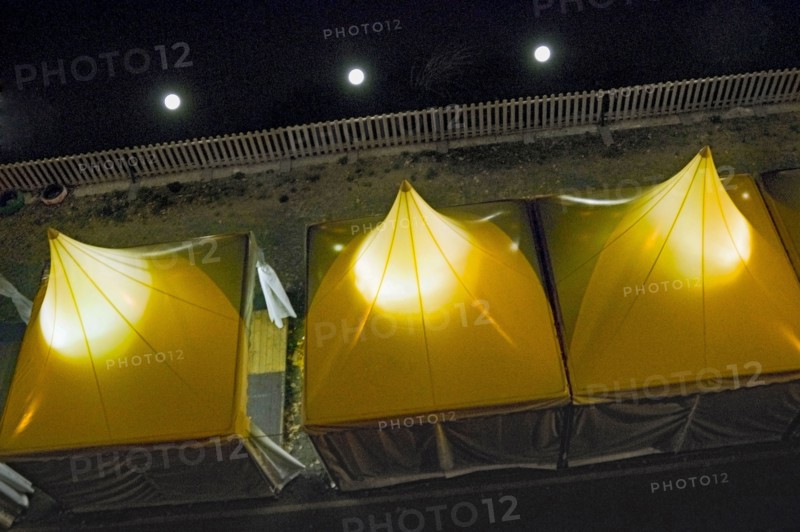 High Angle View of Tented Shops along Tiber River