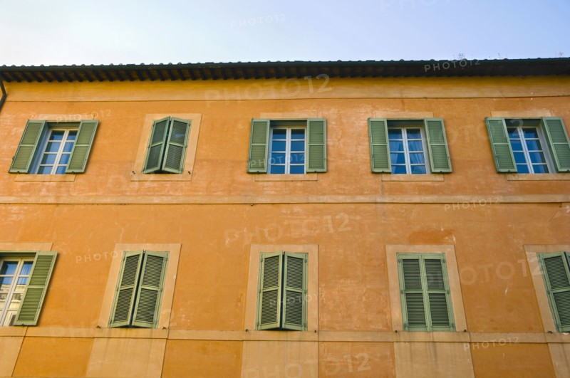 Shuttered Windows of Apartment Building