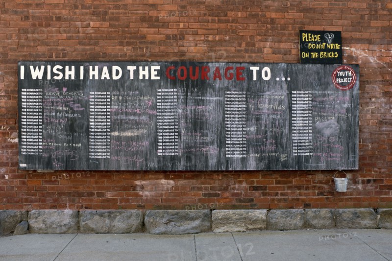 Public Chalkboard on Brick Wall
