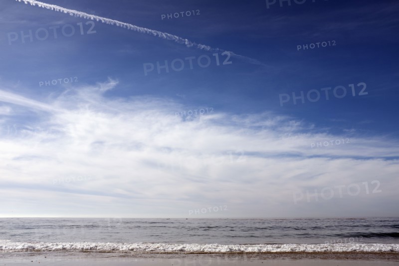 Small Waves on Sandy Beach