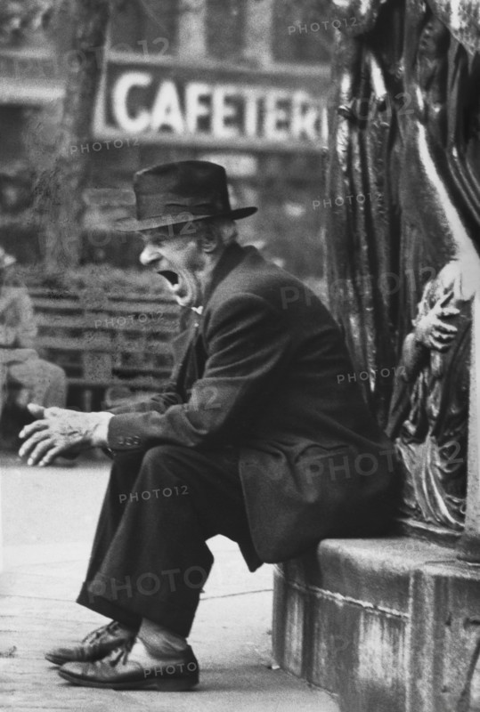 Yawning Man sitting in Union Square Park