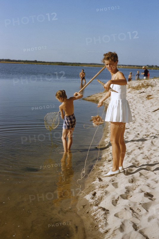 Family crabbing at Beach