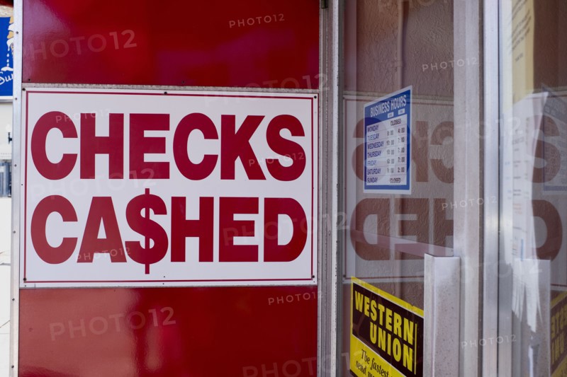 Checks Cashed Sign on Wall of Financial Services Business