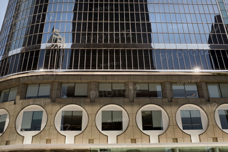Keyhole windows at base of Modern Office Building