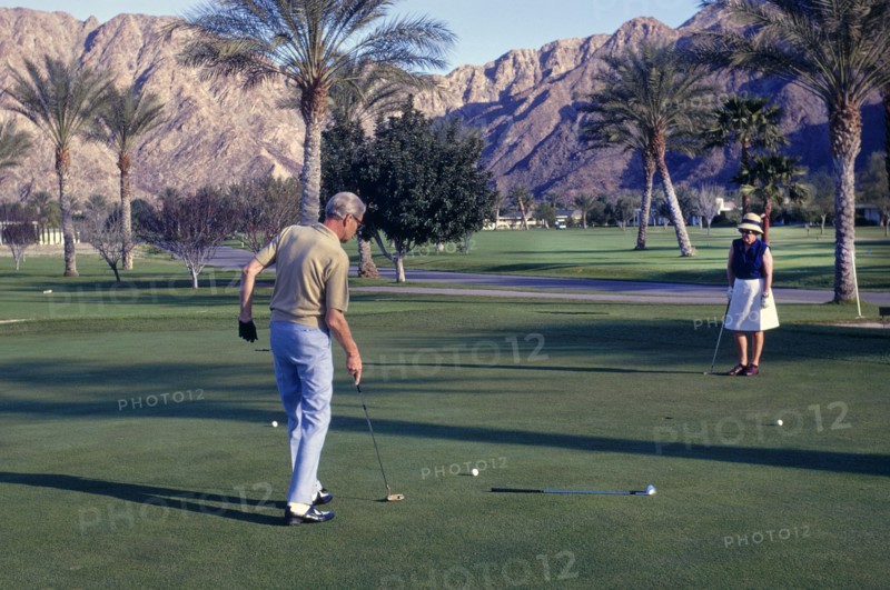 Man and Women on Putting Green