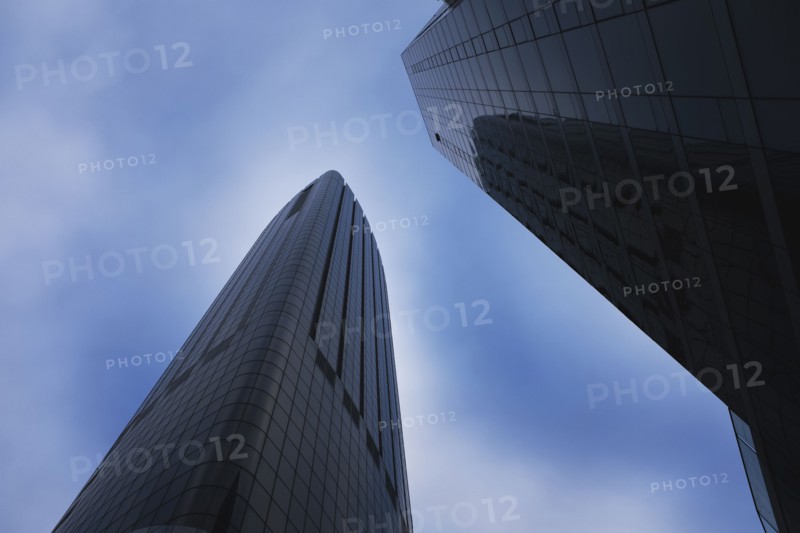 Low Angle View of Two Modern Glass Buildings