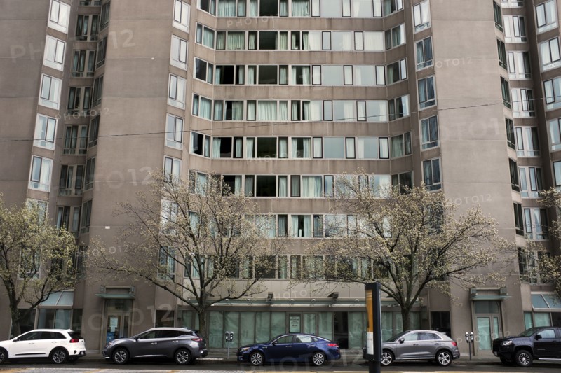 Cars Parked in front of Residential Building