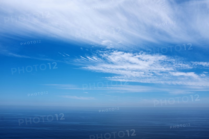 Clouds and blue sky over the Pacific Ocean