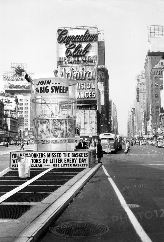 Large Trash Can with sign that reads "Join the Big Sweep" Times Square