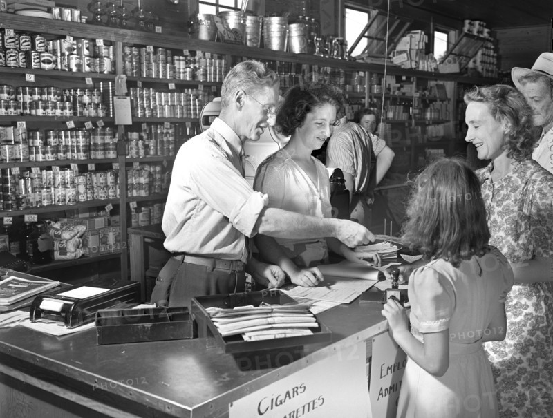 Customer receiving Change from Clerk after shopping at Cooperative Store