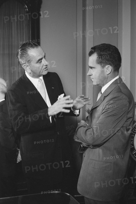 U.S. Senator Lyndon Johnson speaking with U.S. Vice President Richard Nixon