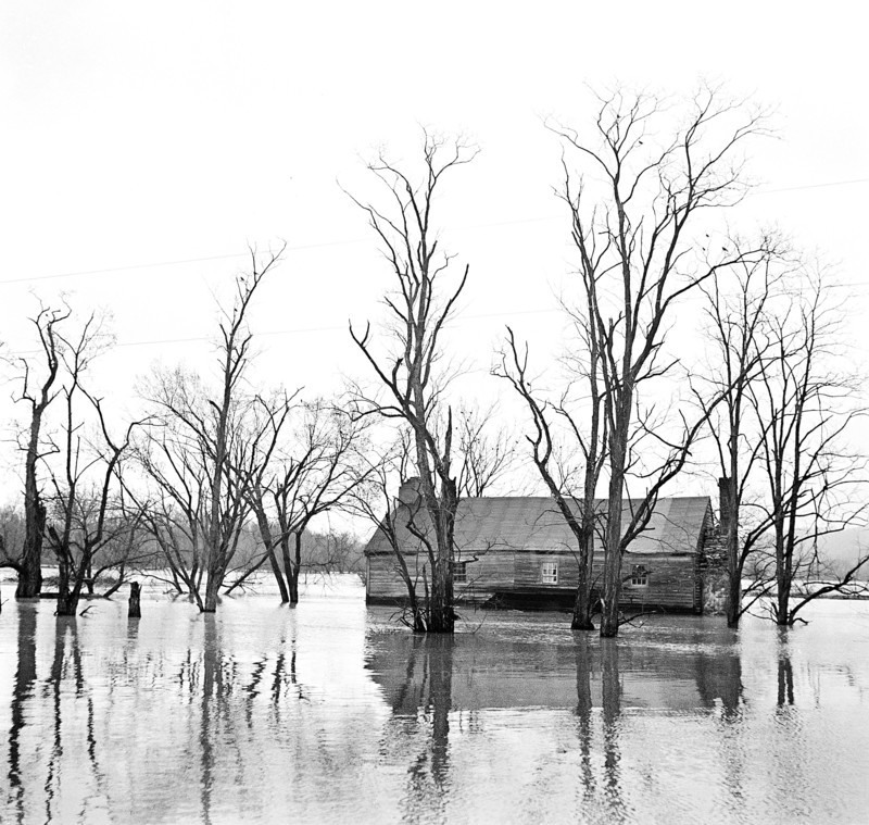 Flood waters of the Shenandoah River covering farm