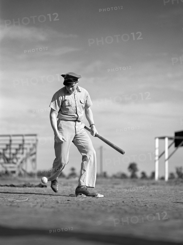 Man playing baseball