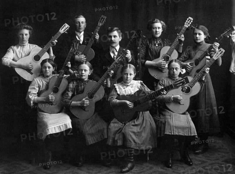 Portrait of a Group of Young Musicians with Acoustic Guitars