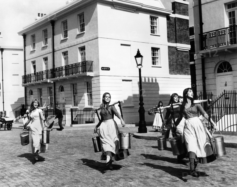 Milkmaids during "Who Will Buy" musical number