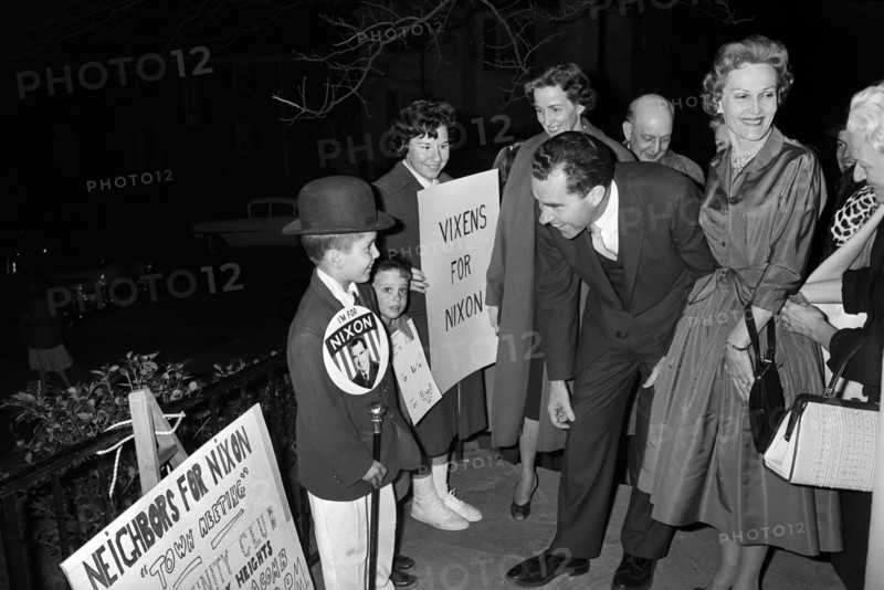 U.S. Presidential candidate Richard M. Nixon and his wife Pat Nixon greeting supporters including women and children